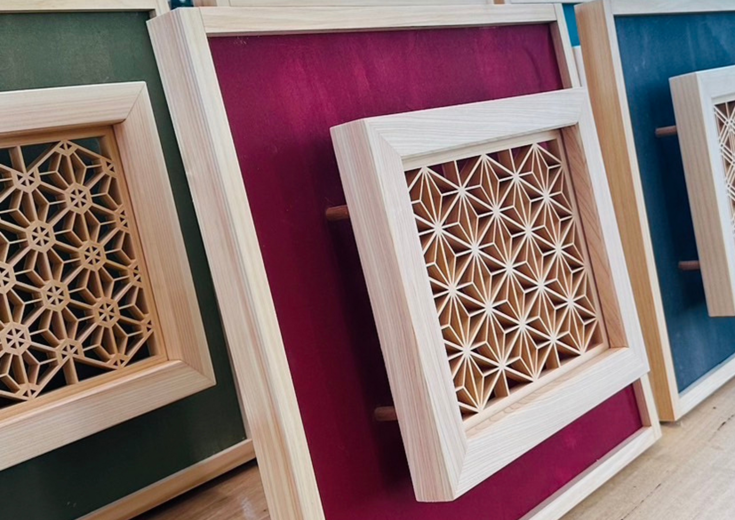 Kumiko wood panel with red washi and hinoki frame