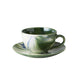 marble green coffee cup and saucer